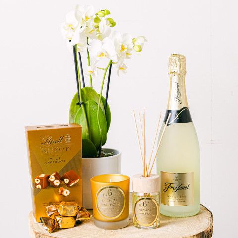Product photo for Fascino d'oro: Candela, Mikado, Cava e Orchidea